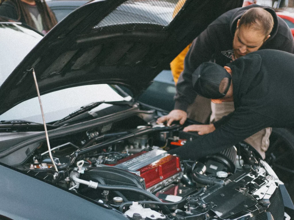 Mobile certified auto inspection at Cypress Creek Lakes with two technicians providing a comprehensive check.