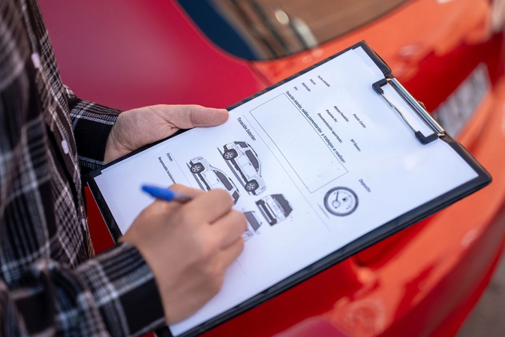 Detailed pre-purchase checklist for before you buy car inspection Houston, marking exterior vehicle condition.